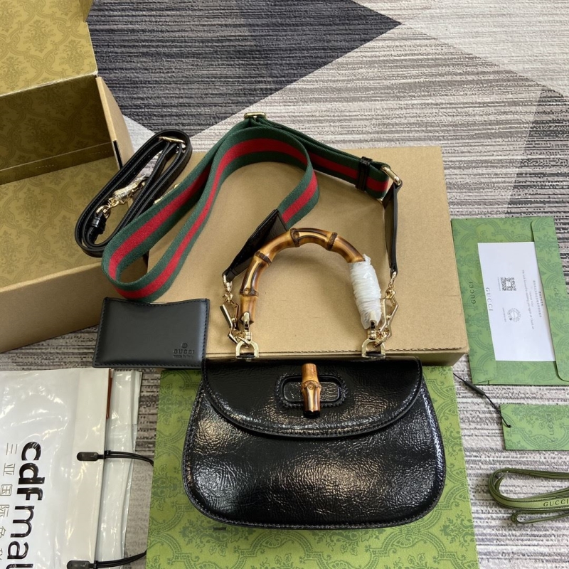 G*u*i top handle bags